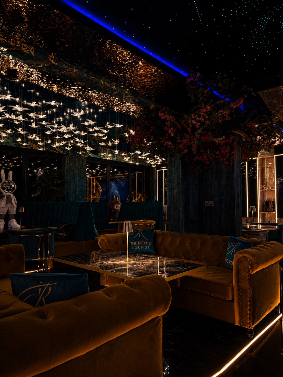 Low-lit lounge interior at The Royce